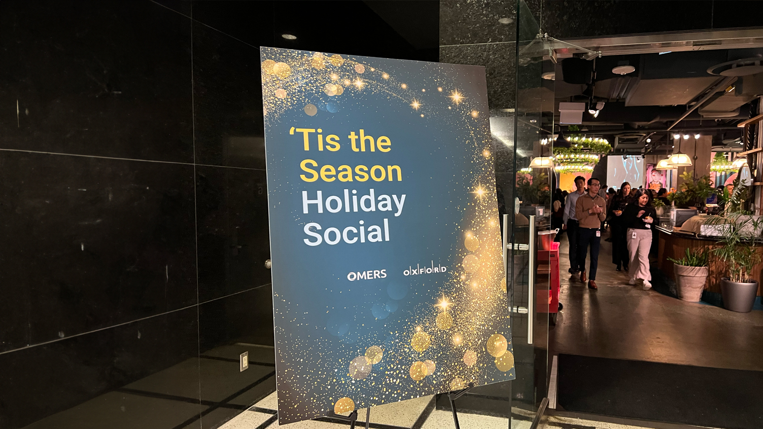 Signage for the OMERS & Oxford holiday social